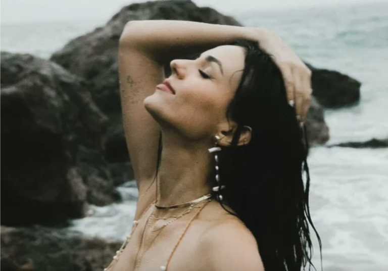 Victoria Justice Stuns in Behind-the-Scenes Footage of ‘Down’ Music Video, Showcasing Her Beach Body and Modelesque Charm